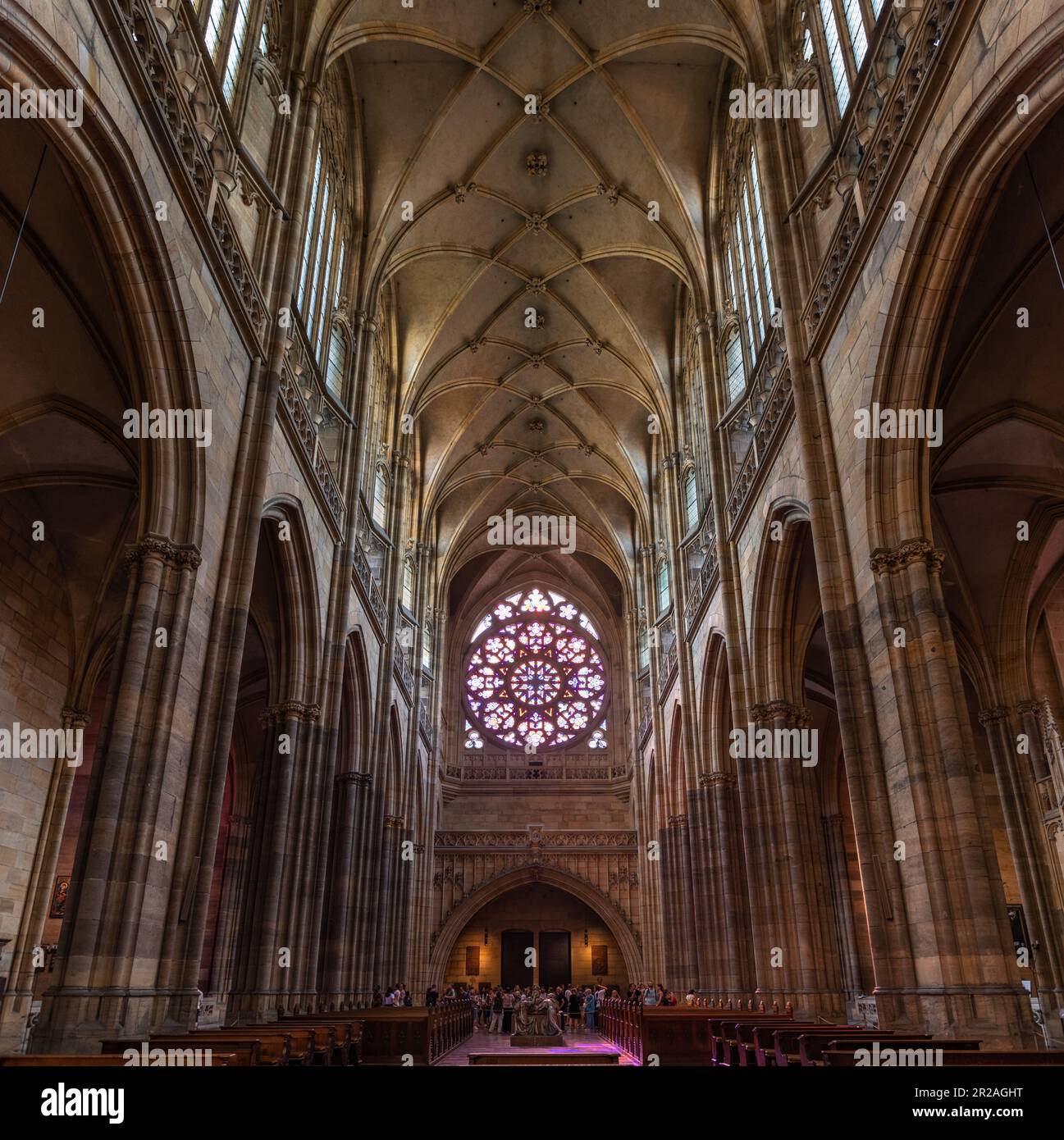 PRAGUE, CZECH REPUBLIC - AUGUST 25, 2022: Inside view of the main nave of St. Vitus Cathedral within the Prague Castle complex in the Czech Republic. Stock Photo