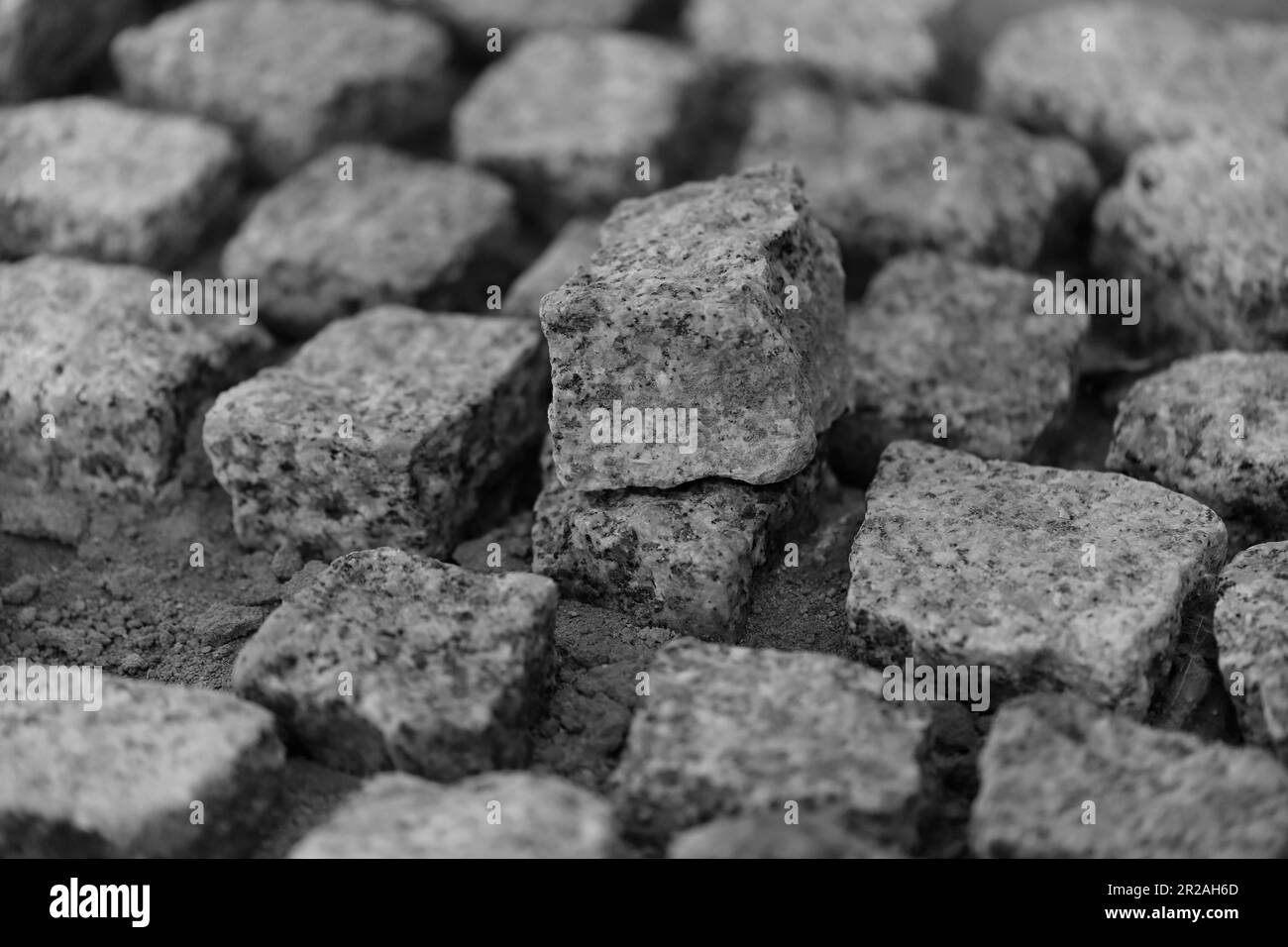 Granite paving stones during laying Stock Photo Alamy