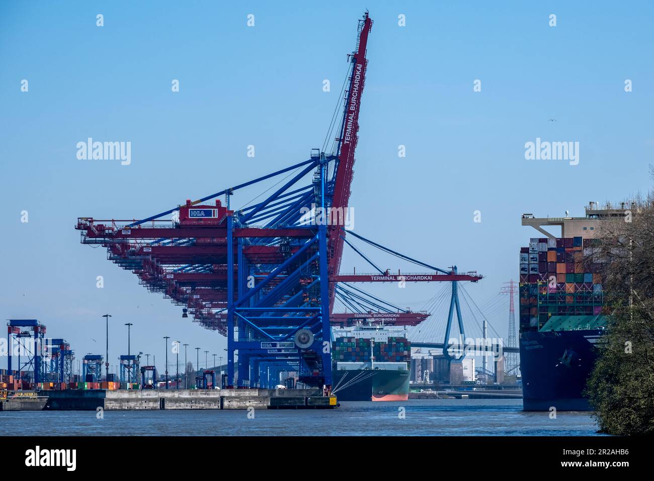 Hamburg, Germany - 04 17 2023: View of the container cranes at Burchardkai in the Port of Hamburg from the water Stock Photo