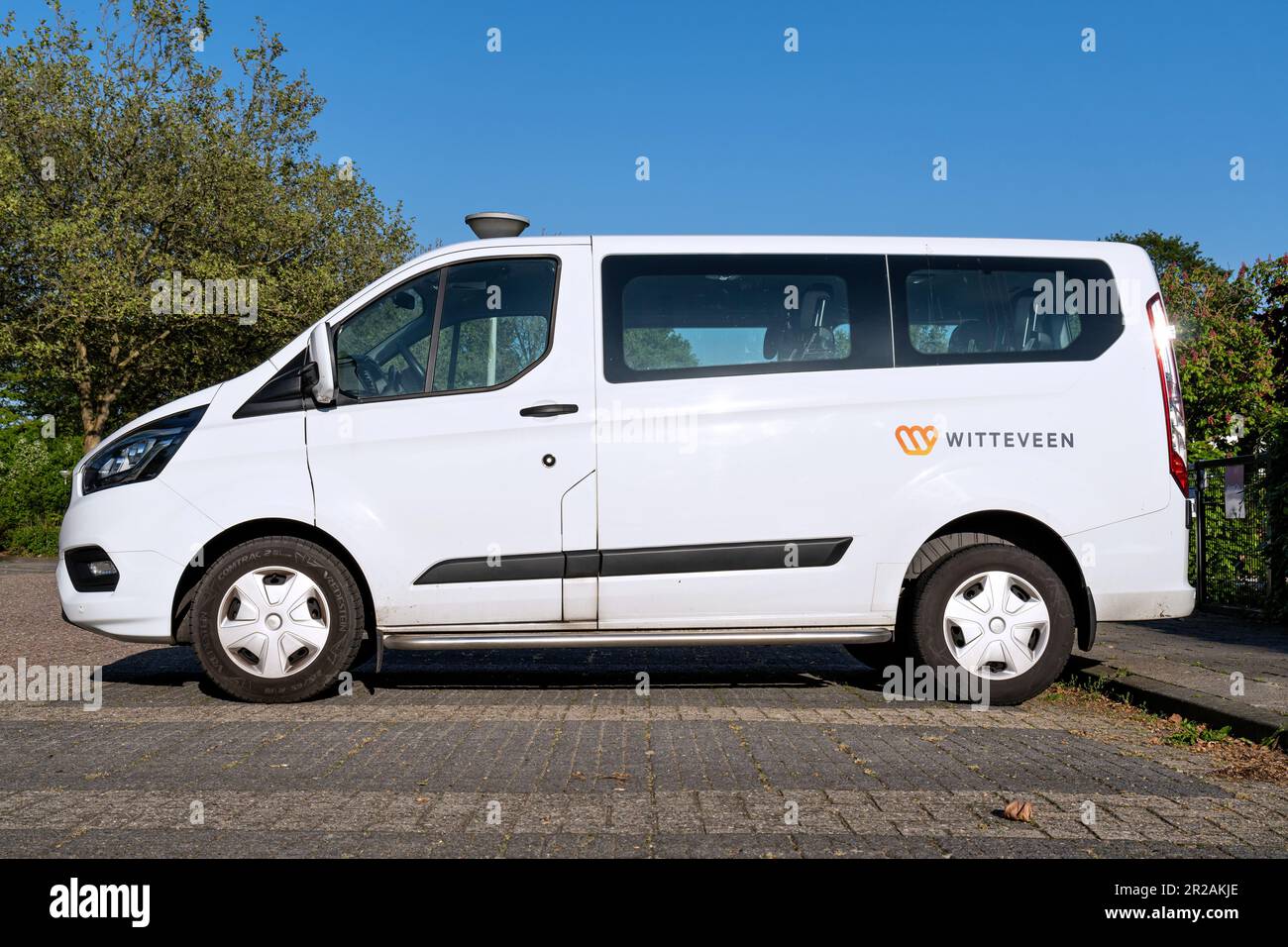 Taxi Witteveen Ford Transit Custom minibus Stock Photo - Alamy