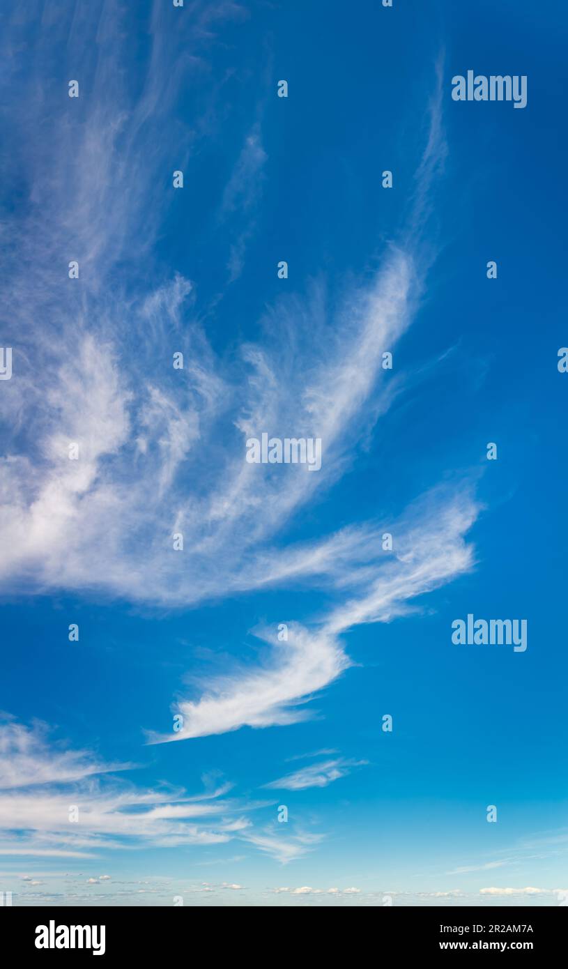 Fluffy clouds on a clear sunny day Stock Photo - Alamy