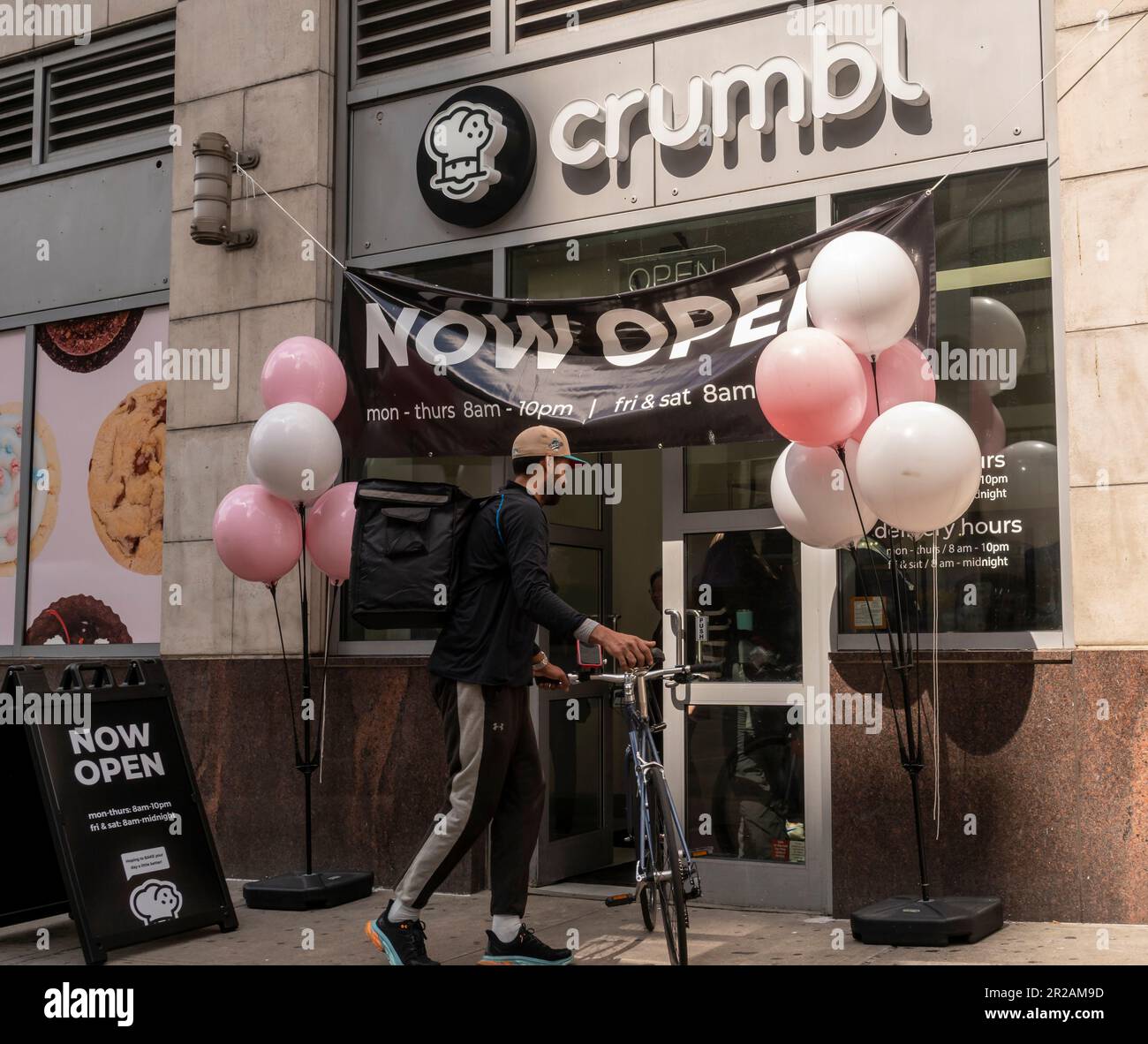 A branch of the popular Crumbl cookies chain in Chelsea in New York on Friday, May 5, 2023. The large cookies are meant to serve four people each and the company introduces a bevy of new flavors each week. (© Richard B. Levine) Stock Photo