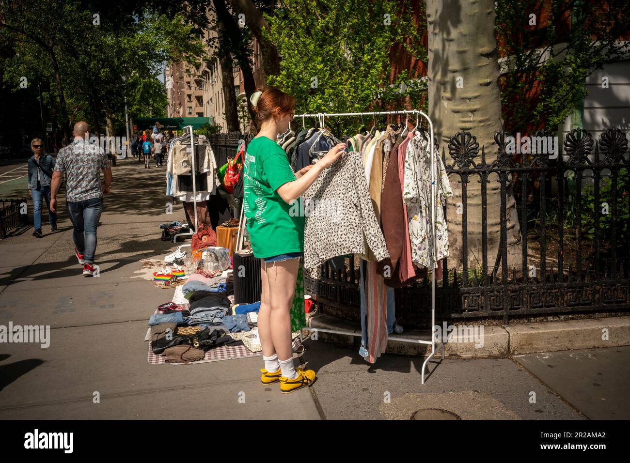 Entrepreneur sells clothing outside of Washington Square Park in New York on Sunday, May 7, 2023. (© Richard B. Levine) Stock Photo
