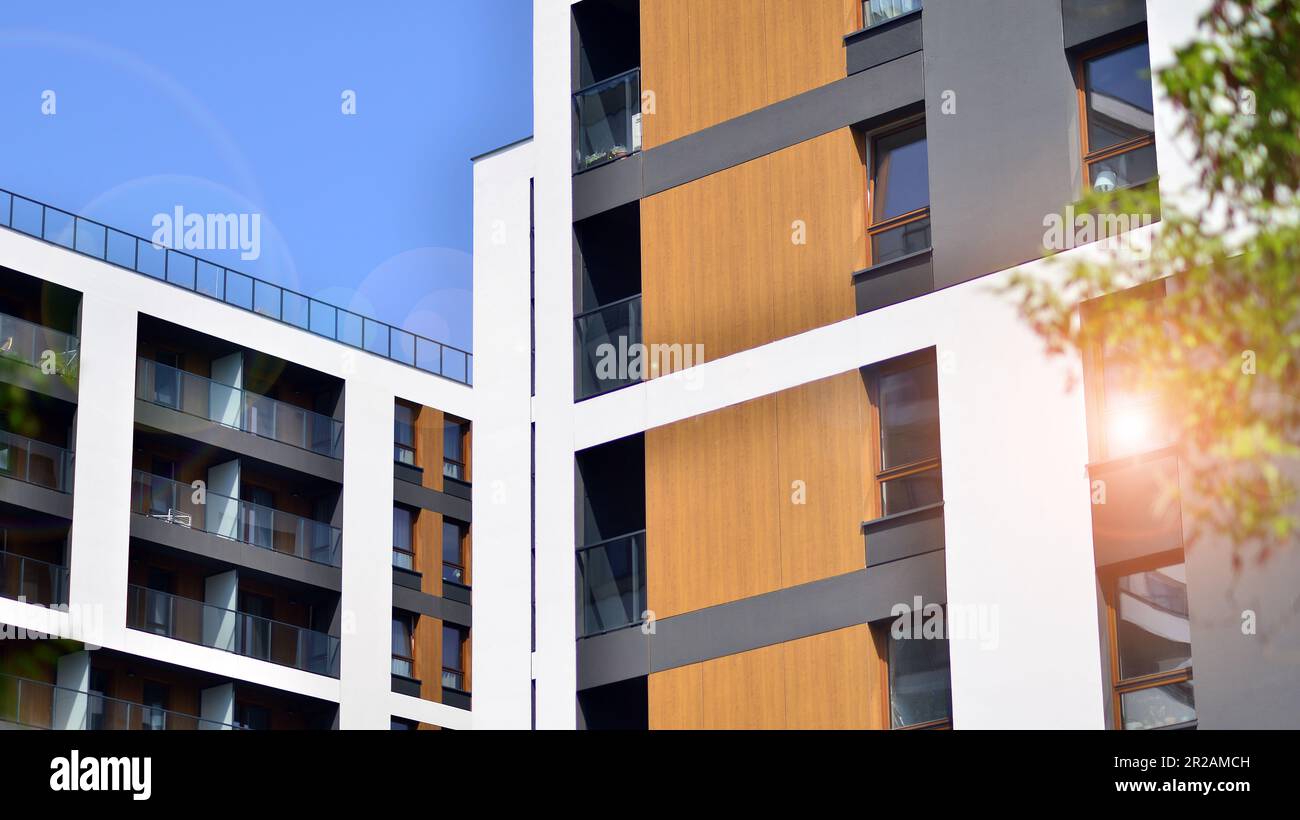Image showcasing Eco architecture. Green tree and new apartment building. The harmony of ...