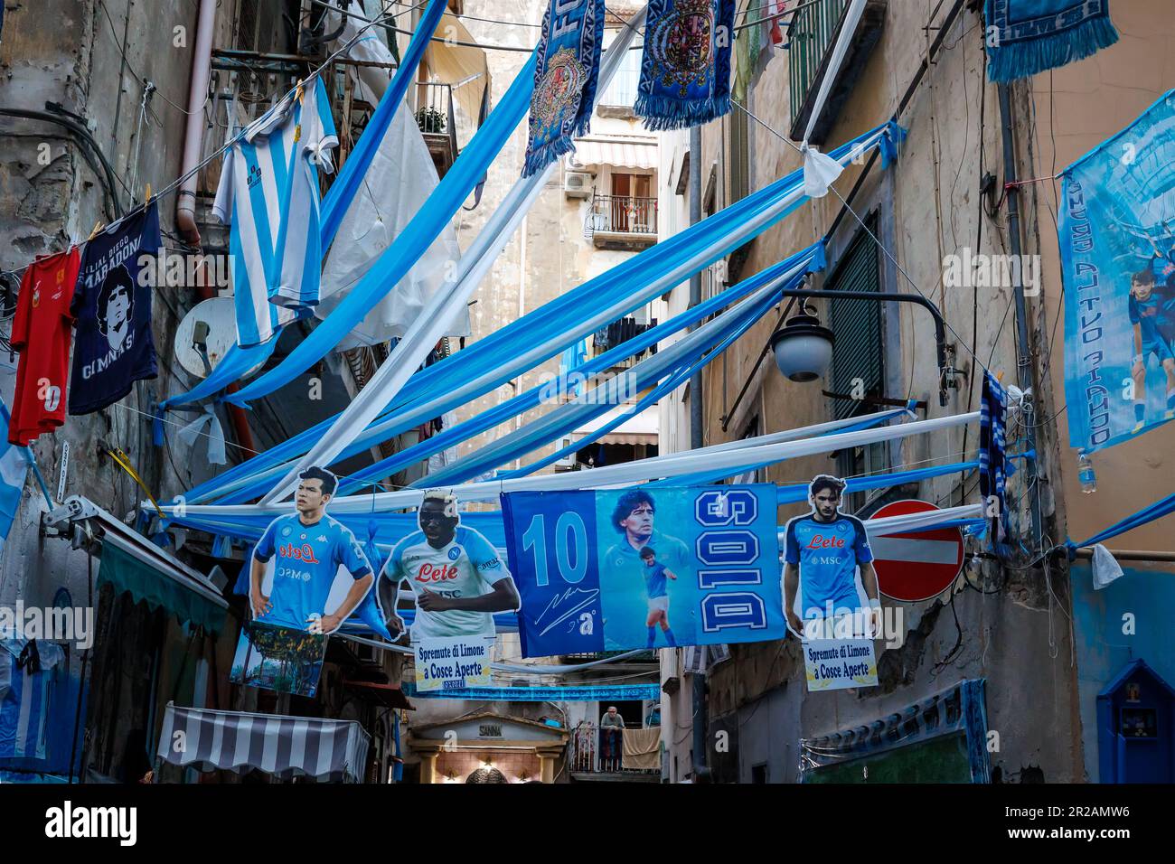 Naples, Italy - May 5, 2023: Decorations in the streets of the city celebrate the victory of the soccer championship of the Napoli team. Banners, flag Stock Photo