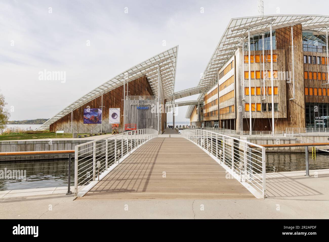 Oslo, Norway - May 2023: A bridge leads to the Astrup Fearnley Museum, an international collection of contemporary art located on Tjuvholmen. Stock Photo