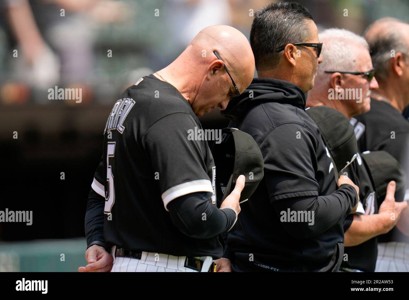 Chicago White Sox manager Pedro Grifol bows his head during the