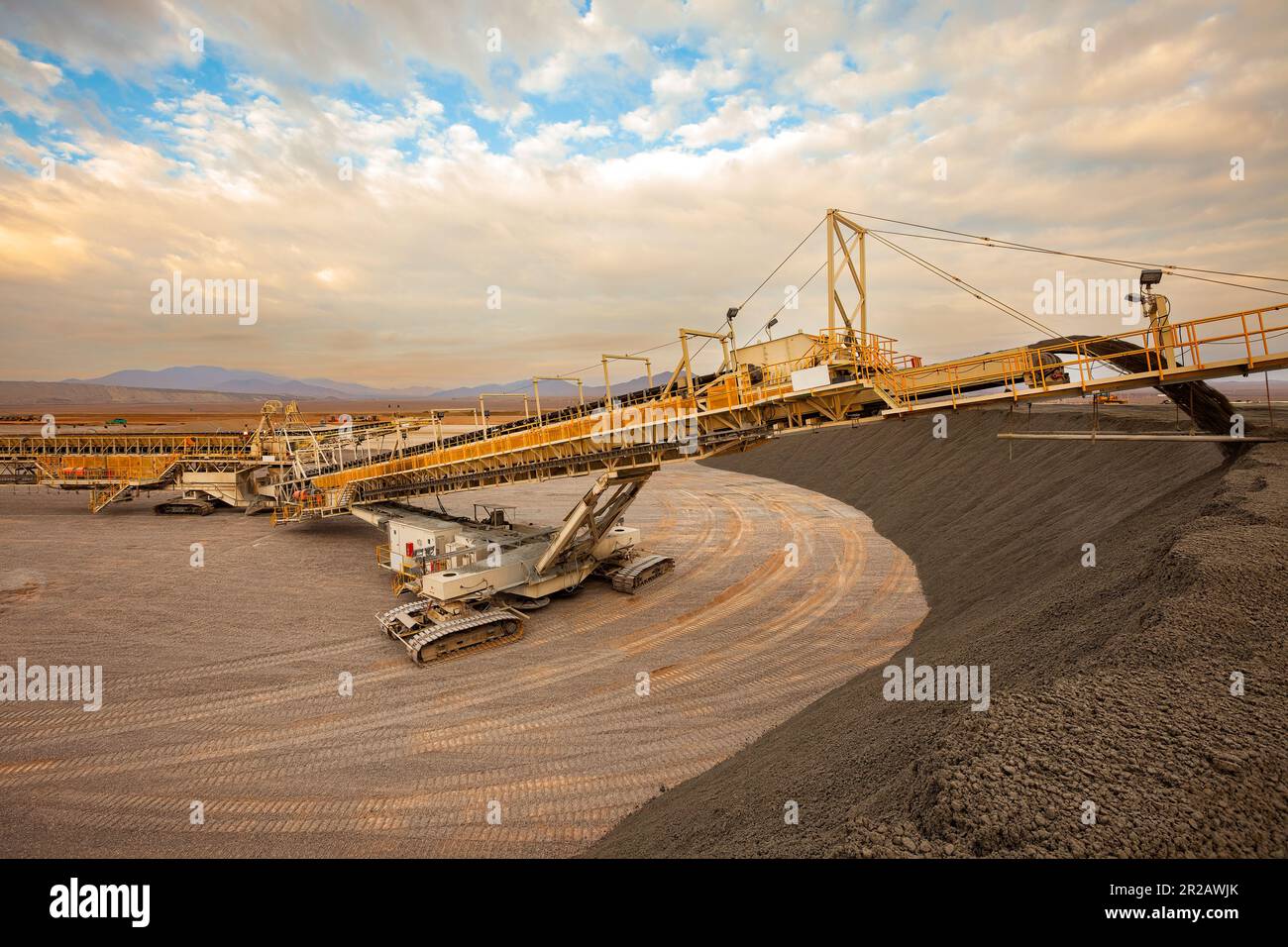Machinery stacking copper sulfide deposits at a copper mine in Chile