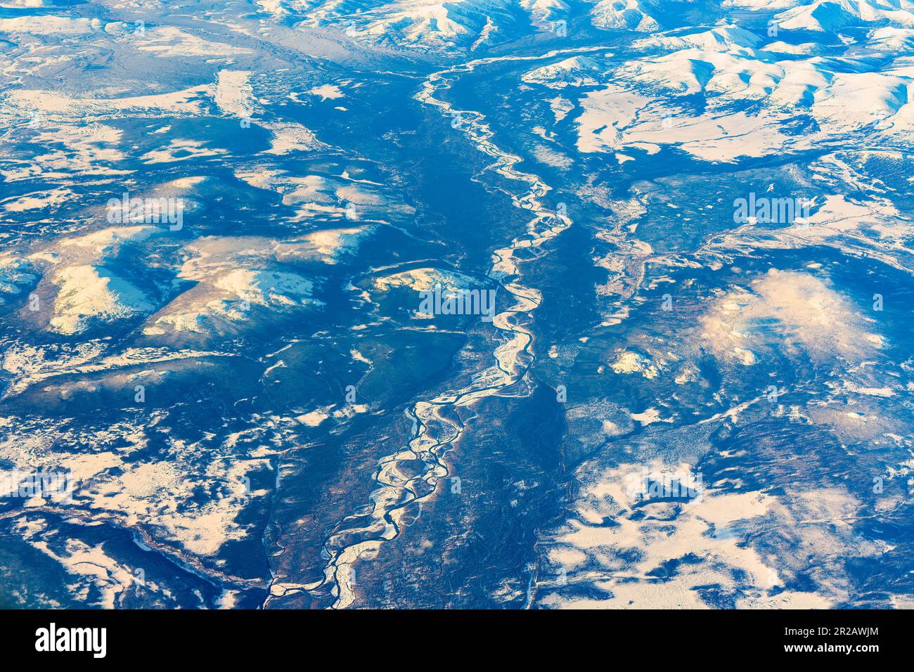 Aerial view of frozen mountains and rivers in the North Pole Stock Photo