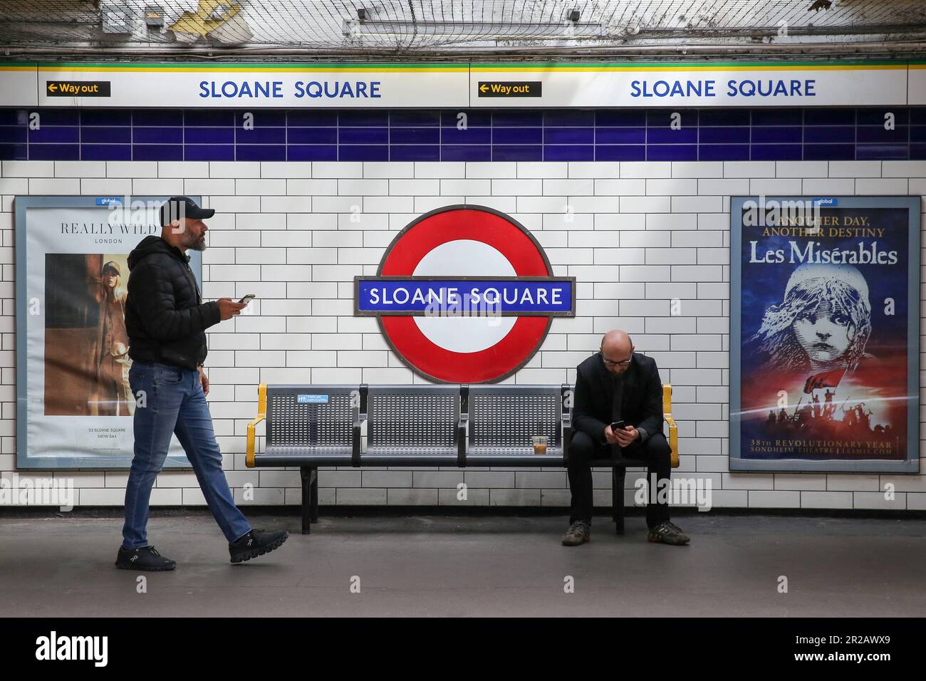 Passengers at Sloane Square London underground station. Stock Photo