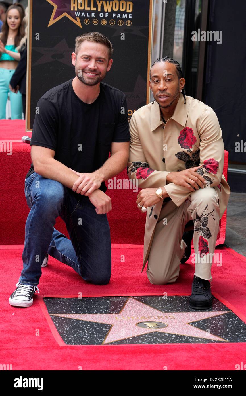 Ludacris, right, poses with Cody Walker, brother of Paul Walker, during