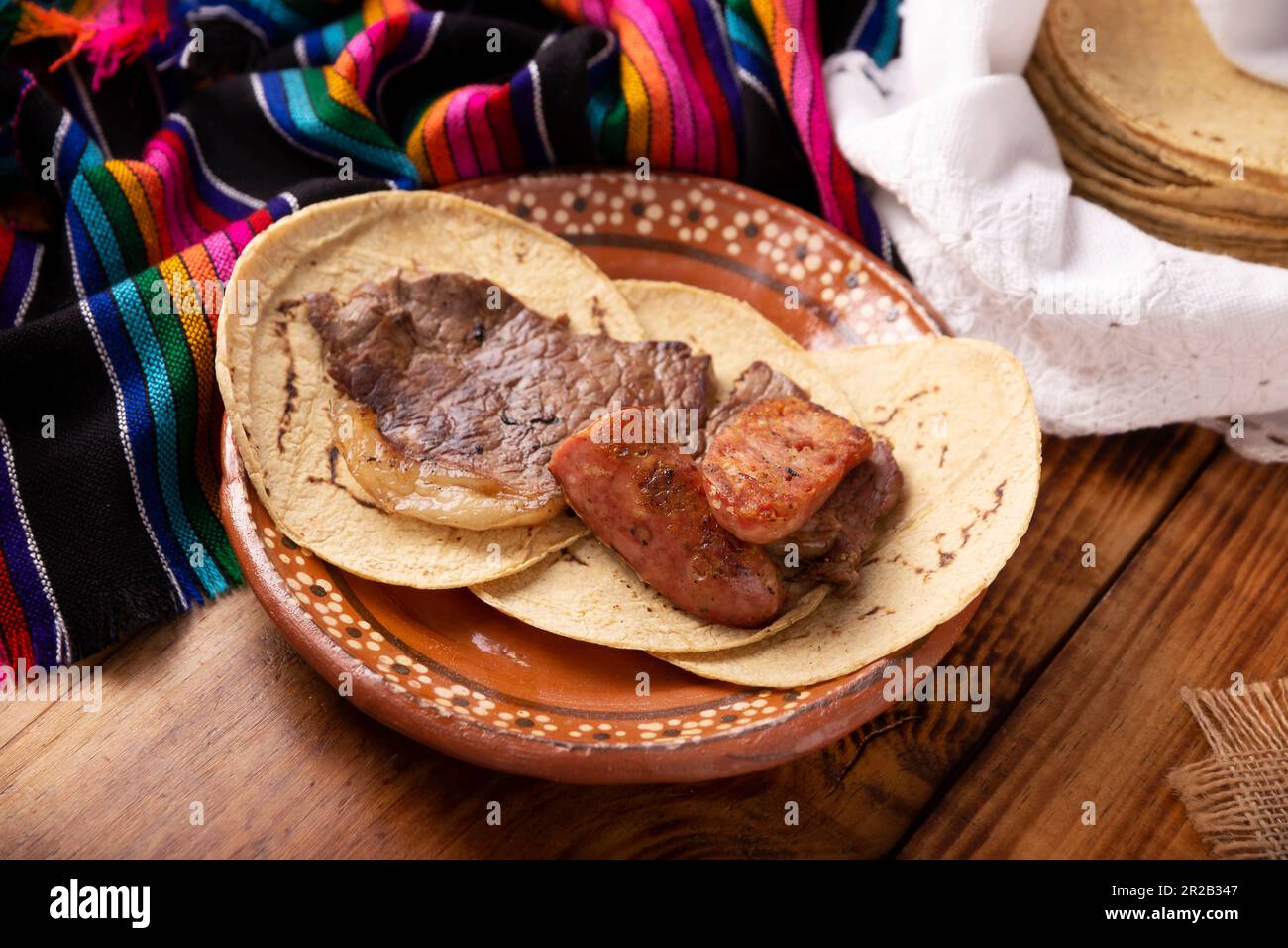 Taco campechano style, Carne Asada. (roast meat) and chorizo or longaniza,  very popular dish in northern Mexico, also called Asado, Discada or Parrill  Stock Photo - Alamy