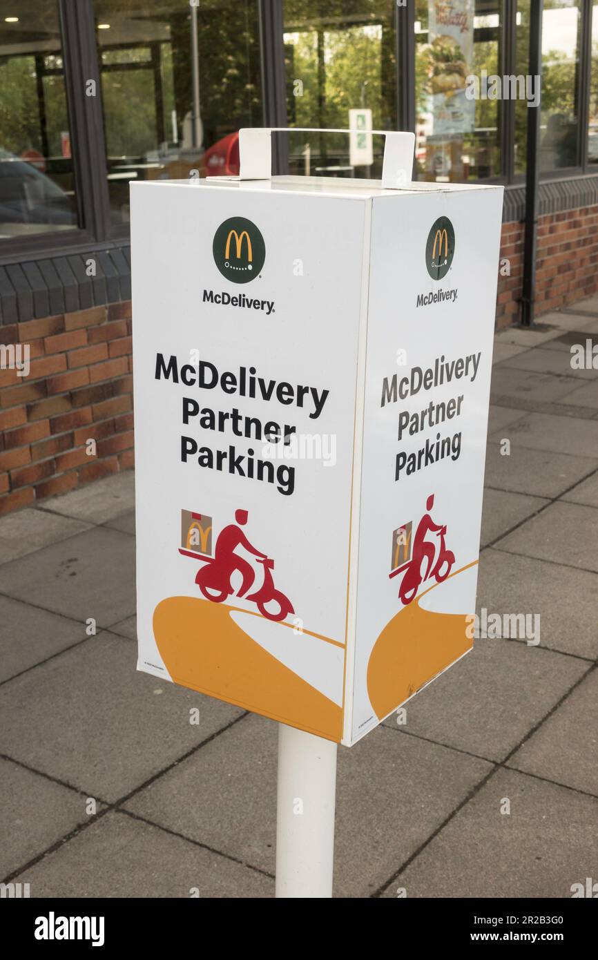 McDelivery Partner parking bay at a motorway service station in England, UK Stock Photo