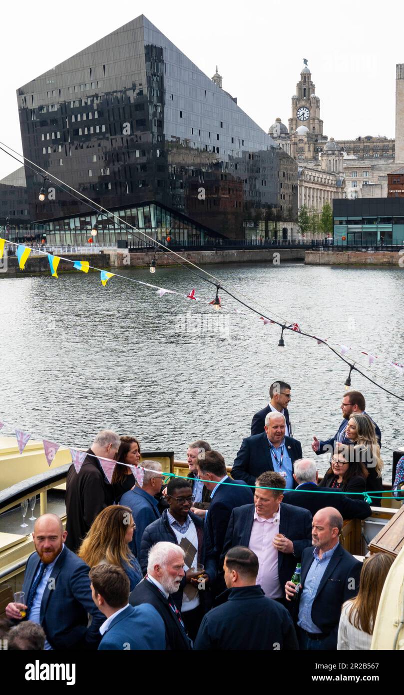 Business party on tour boat in Royal Albert Dock Stock Photo