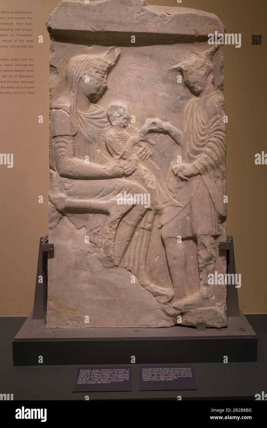 Grave stele showing a family (480-425 B.C) . Diachronic Museum of Larissa , Greece Stock Photo