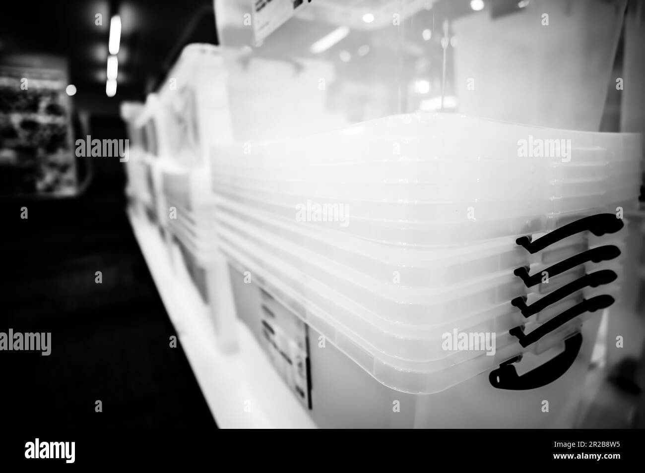 Rows of stacked plastic containers for organization and storage Stock
