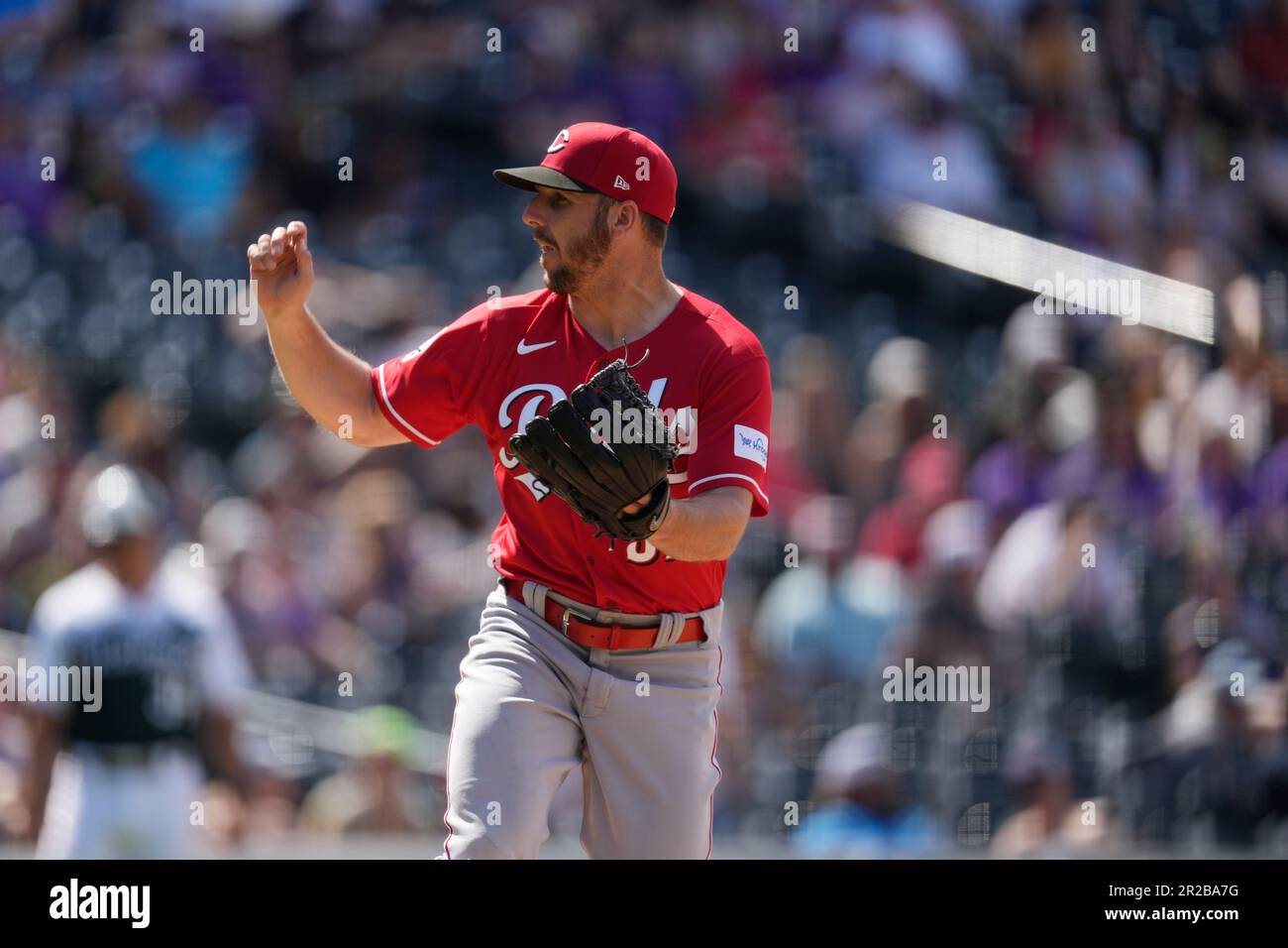 Cincinnati Reds relief pitcher Kevin Herget (57) in the eighth inning of a baseball game Wednesday, May 17, 2023, in Denver. (AP Photo/David Zalubowski) Stock Photo