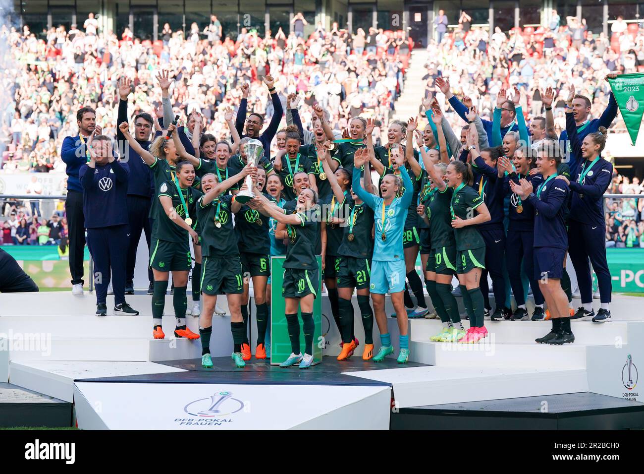 Cologne, Germany. 18th May, 2023. Players of VFL Wolfsburg celebrate their victory of the Final and captain Alexandra Popp (11 Wolfsburg) lifts the trophy during the DFB Pokal Final football match between VFL Wolfsburg and SC Freiburg at RheinEnergieSTADION in Cologne, Germany. (Daniela Porcelli/SPP) Credit: SPP Sport Press Photo. /Alamy Live News Stock Photo