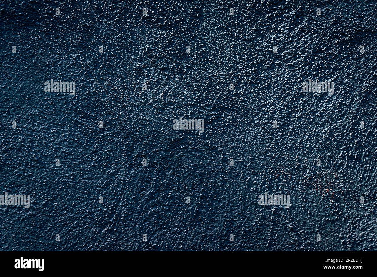 Blue-Black Stucco - Red Scrape Lower Right Stock Photo