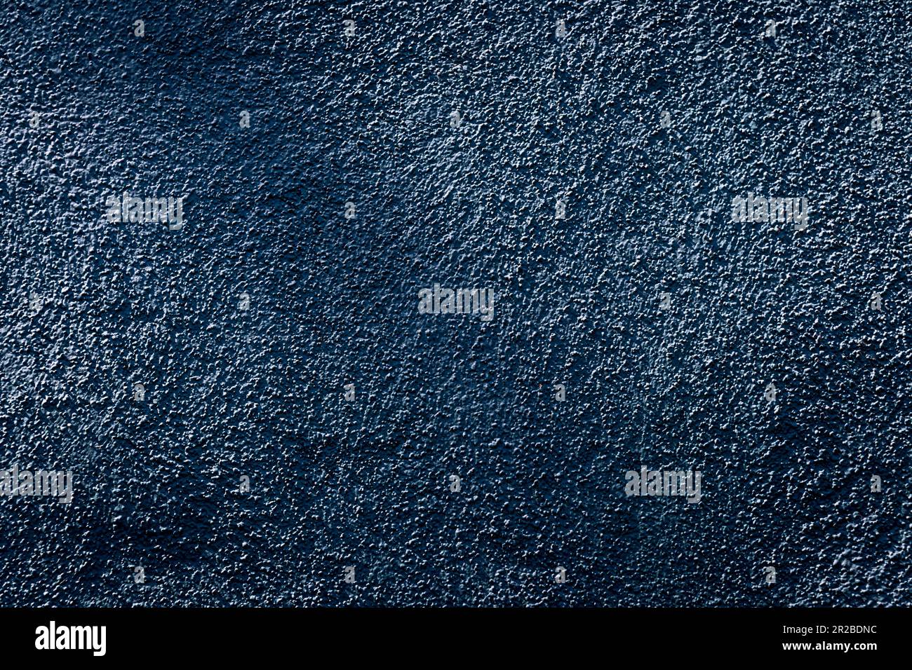 Blue-Black Stucco With Diagonal Shadow Stock Photo