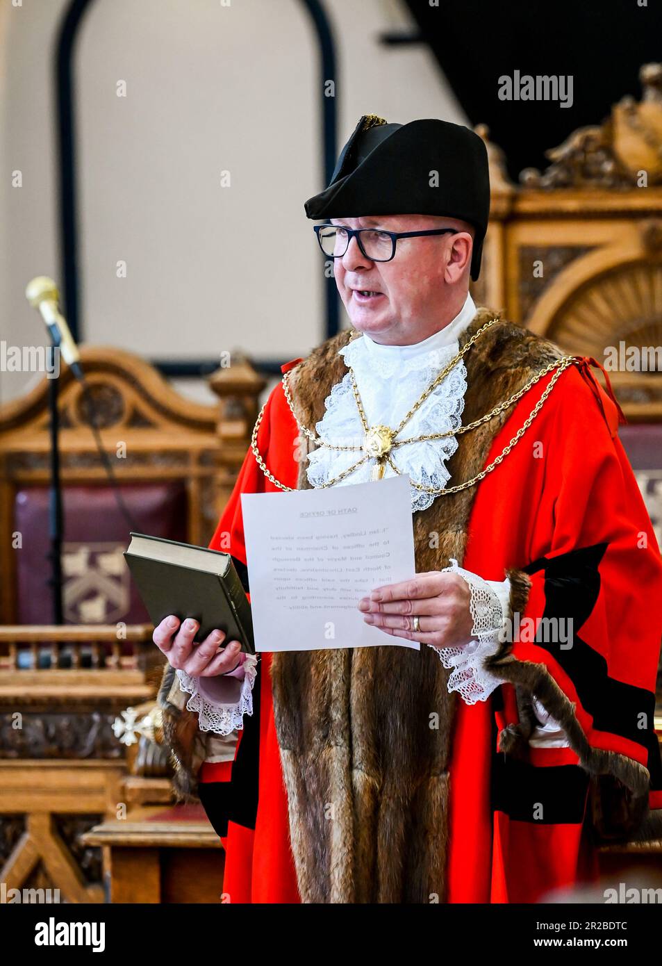 Grimsby, UK, 18th May, 2023. Councillor Ian Lindley is sworn in as newly elected Mayor, during the annual North East Lincolnshire Council Mayor-making ceremony held at Grimsby Town Hall.Councillor Ian Lindley was elected to the role of Mayor of the Borough of North East Lincolnshire, with Councillor Steve Beasant elected to Deputy Mayor of the Borough. 18th May 2023 Photo by Jon Corken, Grimsby Town Hall, Grimsby, UK. Credit: Jon Corken/Alamy Live News Stock Photo