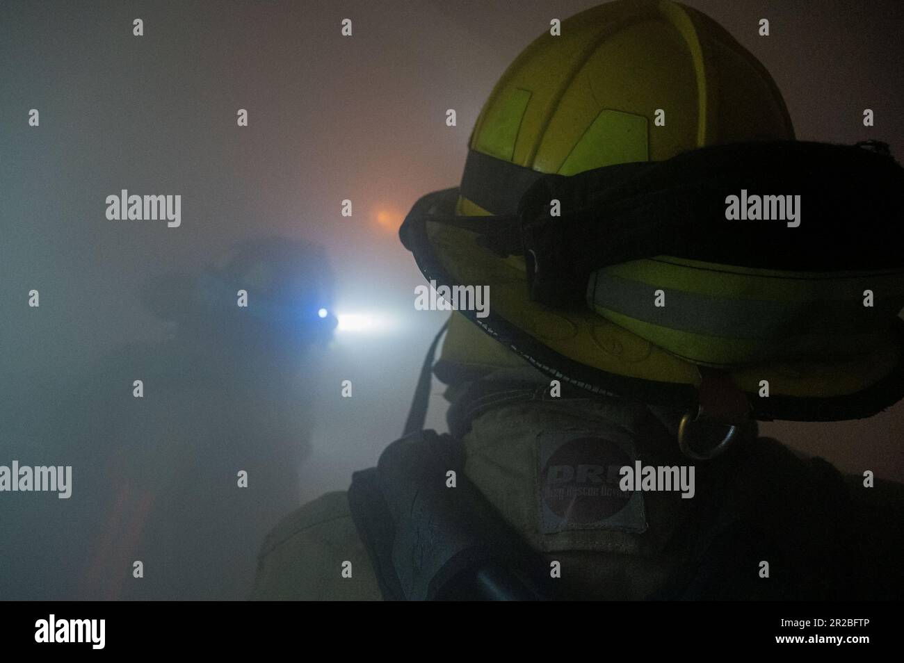 Firefighting Team Five look for a simulated missing crew member during