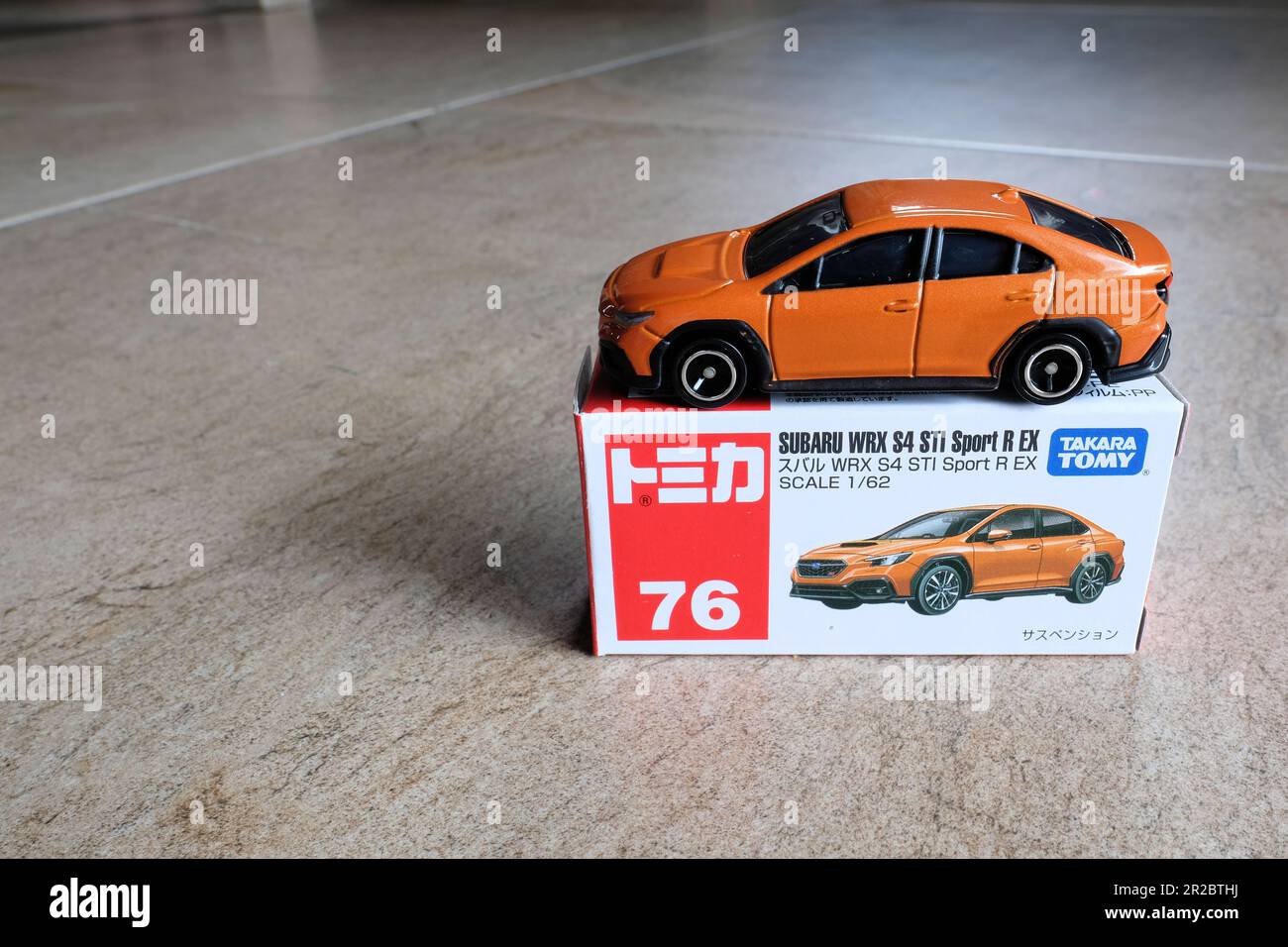 Tomica Takara Tomy #76 Subaru WRX S4 STI Sport R EX Brown Model Car Diecast with package box; toy car; made in Vietnam; Tomy Corporation of Japan. Stock Photo