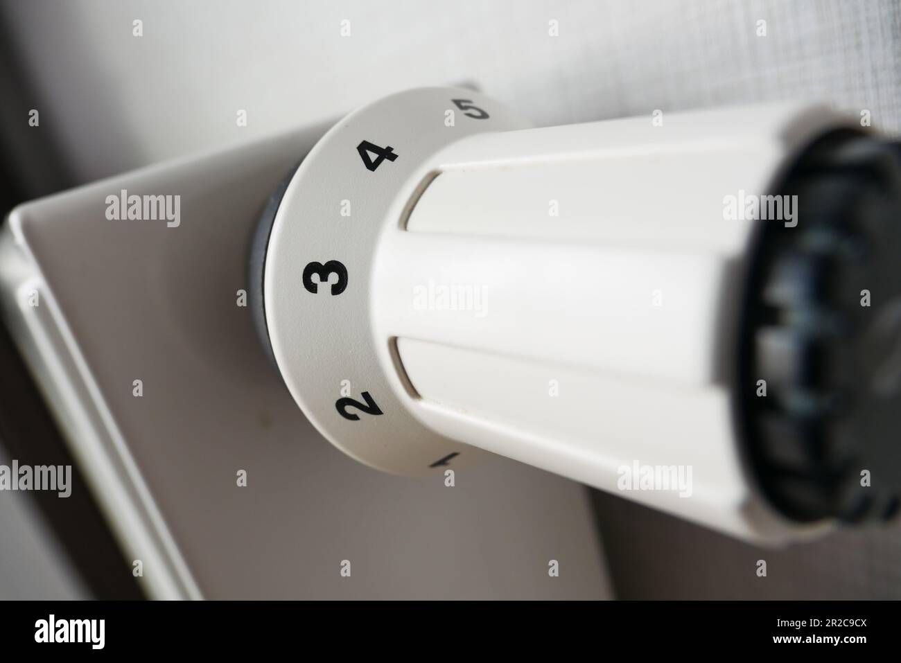 heating radiator under window in the room Stock Photo - Alamy
