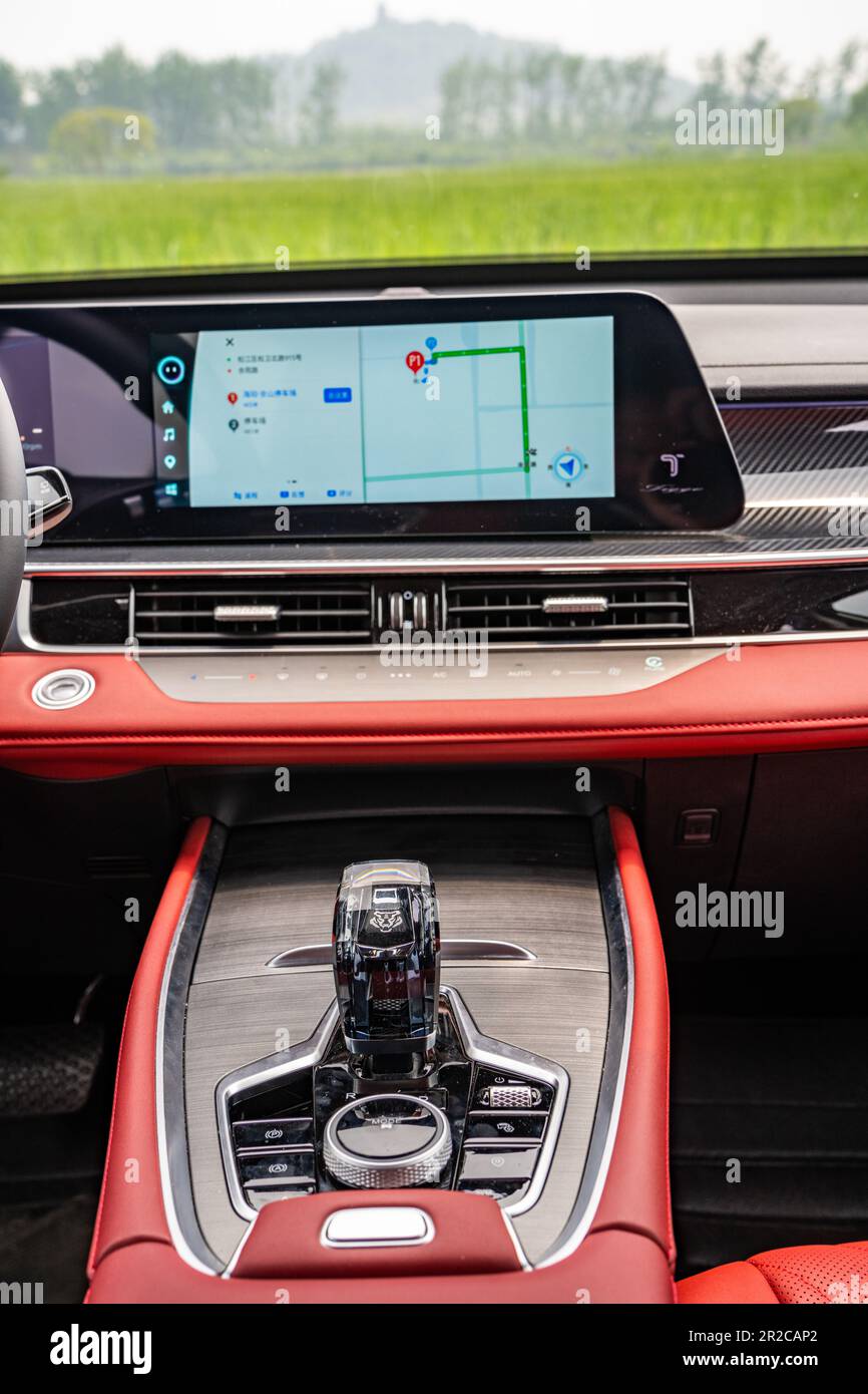 Center console and infotainment screen of a Chery Tiggo 7 Pro (badged at Tiggo 7 Plus for China) SUV car pictured during a test in Shanghai, China. Stock Photo