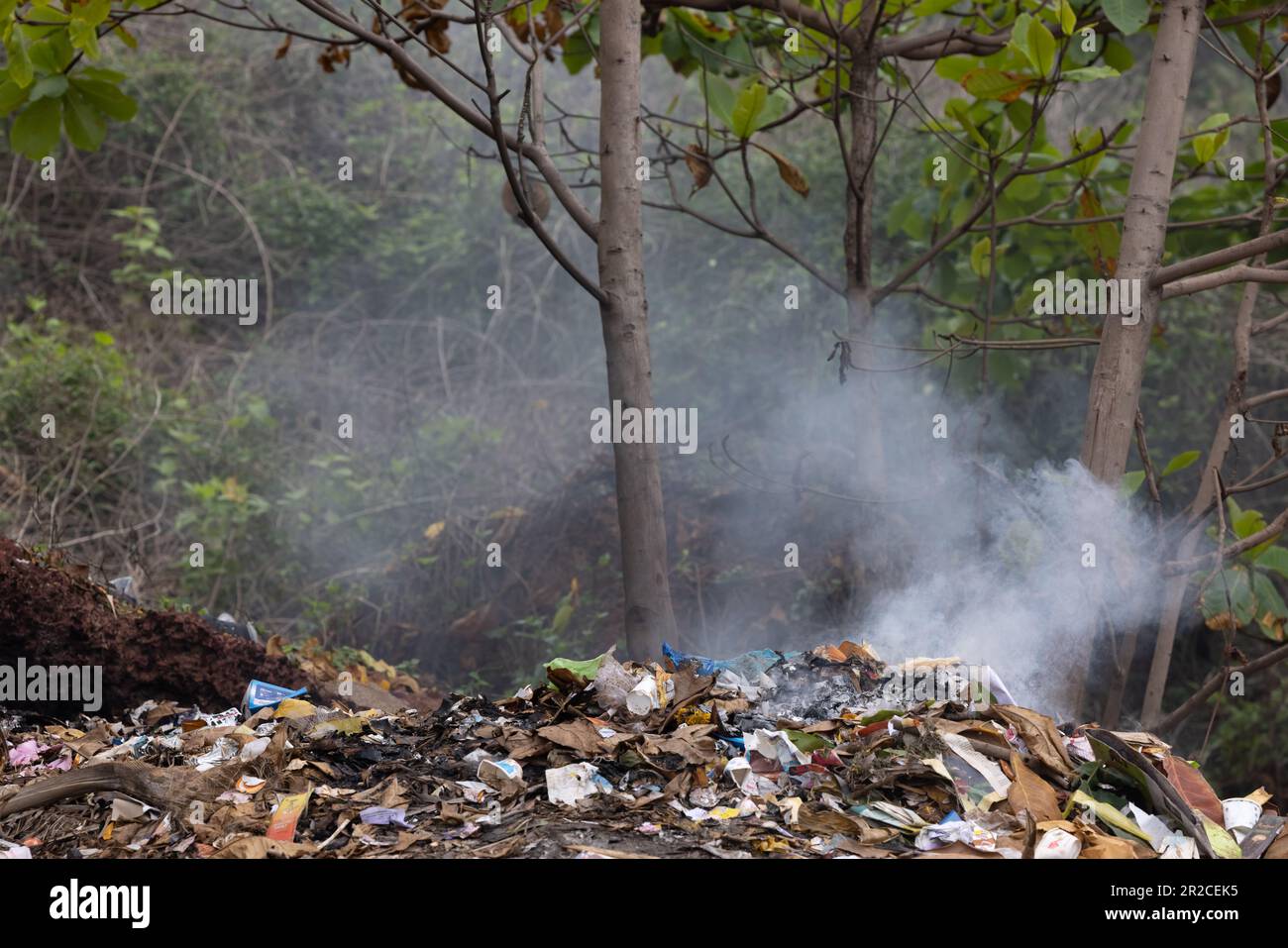 Air pollution by illegal burning pile of plastic trash landfill Stock Photo Alamy