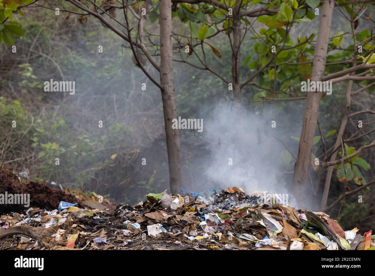 Air pollution by illegal burning pile of plastic trash landfill Stock Photo Alamy