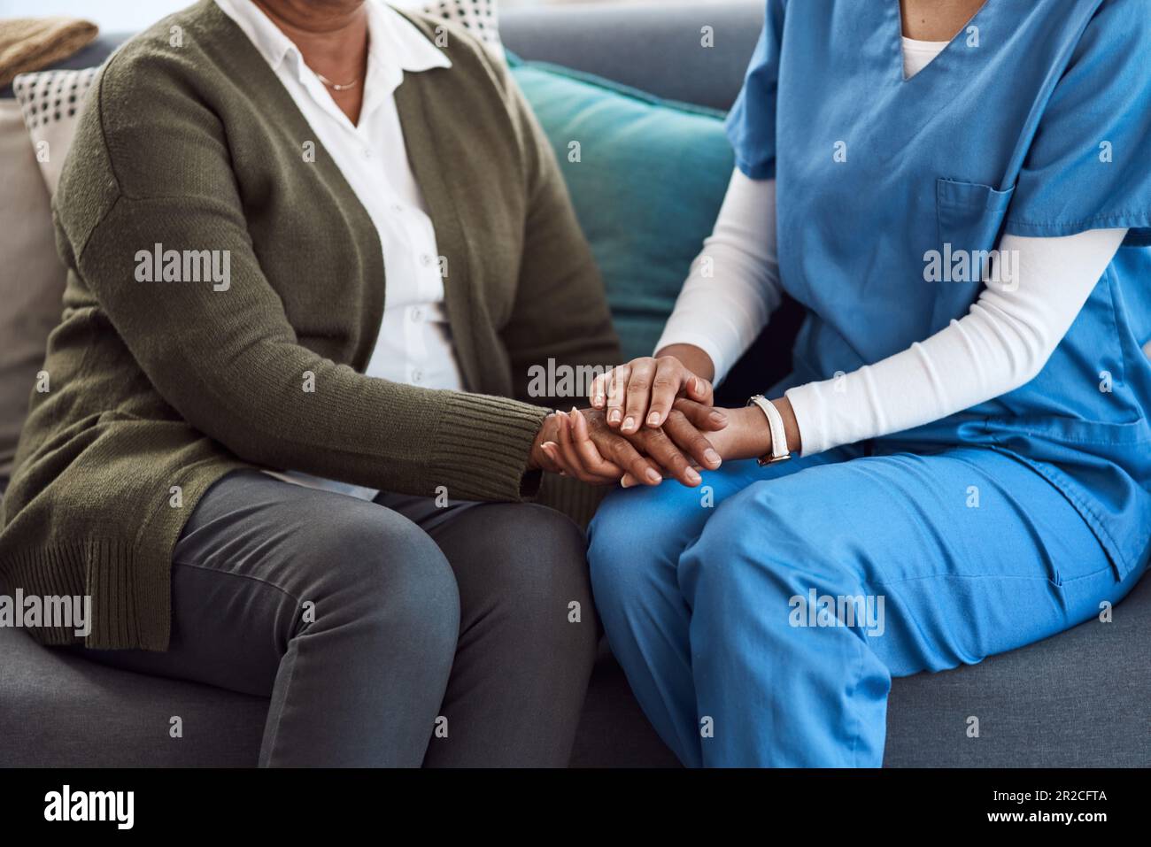 Counseling, woman or nurse holding hands for support or empathy for ...