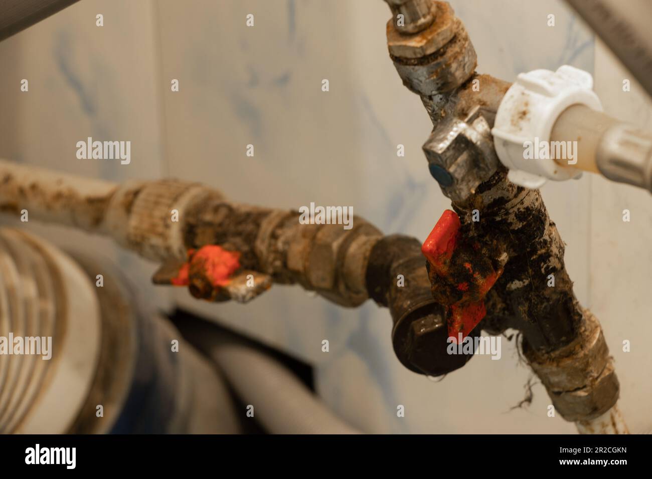 water pipe with taps in the bathroom, repair of the faucet in the