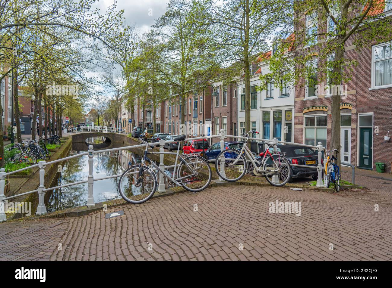 Delft, The Netherlands April 26, 2023 Old Delft canal in spring with