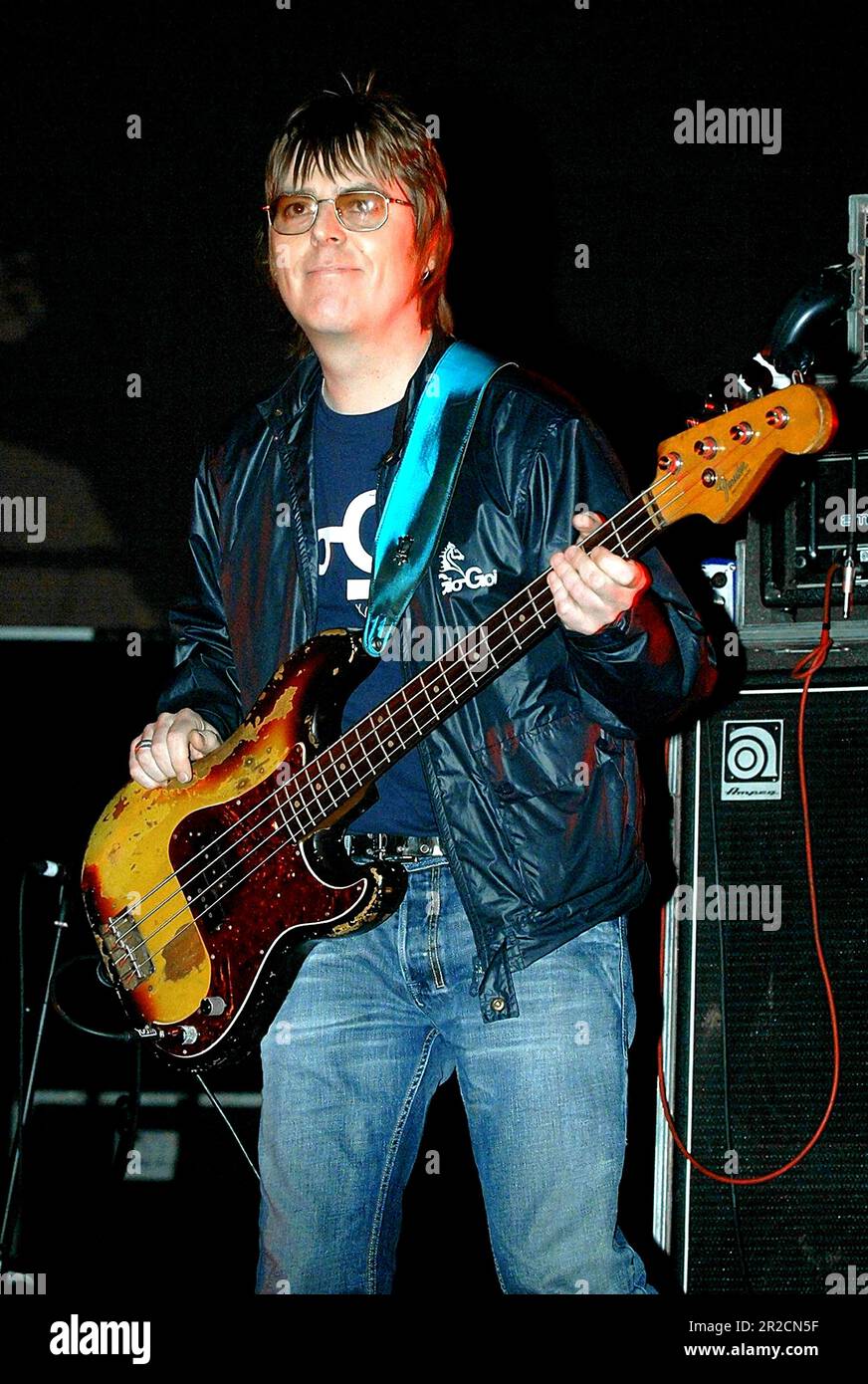 File photo dated 28/01/06 of Andy Rourke (former bassist with The Smiths) on stage with Badly Drawn Boy, during the 'Manchester Versus Cancer' charity concert, held at the Manchester Evening News (M.E.N.) Arena in Manchester. Mr Rourke has died aged 59 after a 'lengthy illness with pancreatic cancer', his former bandmate Johnny Marr has said. Issue date: Friday May 19, 2023. Stock Photo