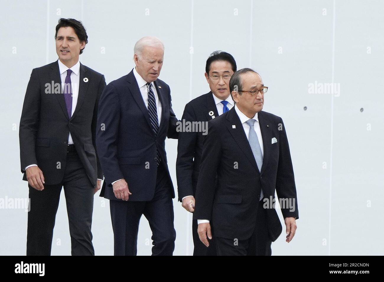 Hiroshima, Japan. 19th May, 2023. (L-R) Canadian Prime Minister Justin Trudeau, US President Joe Biden, Japan's Prime Minister Fumio Kishida and Mayor of Hiroshima Kazumi Matsui walk out of the Peace Memorial Museum to a flower wreath laying ceremony in the Peace Memorial Park as part of the G7 Hiroshima Summit in Hiroshima, Japan, 19 May 2023. (Photo by Franck Robichon/Pool) The G7 Hiroshima Summit will be held from 19 to 21 May 2023. (Credit Image: © POOL via ZUMA Press Wire) EDITORIAL USAGE ONLY! Not for Commercial USAGE! Stock Photo