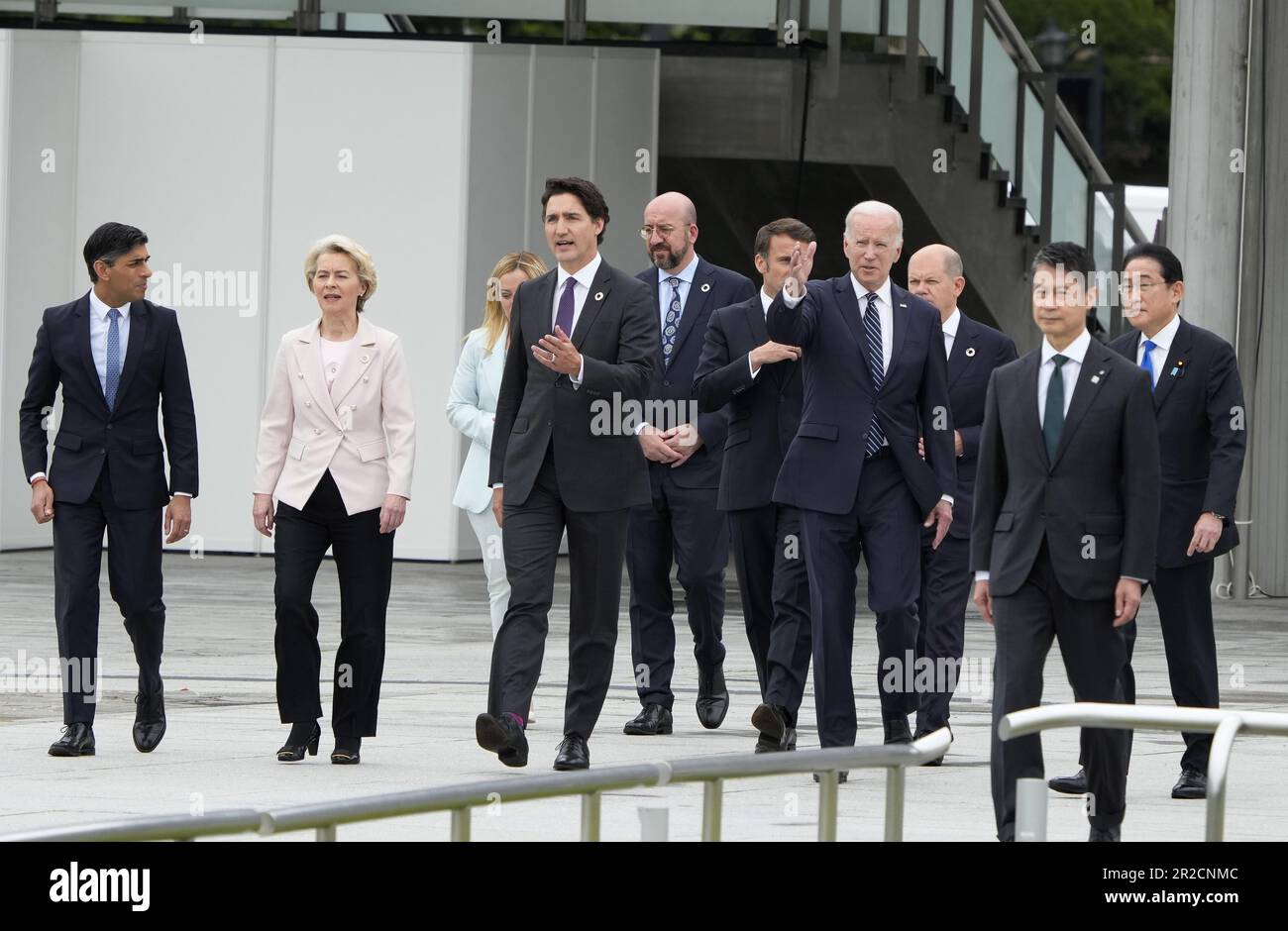 May 19, 2023, Hiroshima, Japan: (L-R) British Prime Minister Rishi Sunak, European Commission President Ursula von der Leyen, Italian Prime Minister Giorgia Meloni, Canadian Prime Minister Justin Trudeau, European Council President Charles Michel, French President Emmanuel Macron, US President Joe Biden, German Chancellor Olaf Scholz, an unidentified official and Japan's Prime Minister Fumio Kishida walk out of the Peace Memorial Museum to a flower wreath laying ceremony in the Peace Memorial Park as part of the G7 Hiroshima Summit in Hiroshima, Japan, 19 May 2023. (Photo by Franck Robichon / Stock Photo