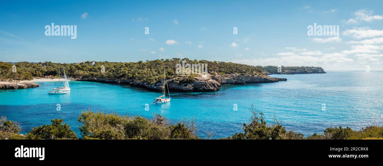 Cala Mondrago bay with beach and blue sea at Mallorca. Idyllic vacation and travel destination at Balearic islands. Panoramic view Stock Photo