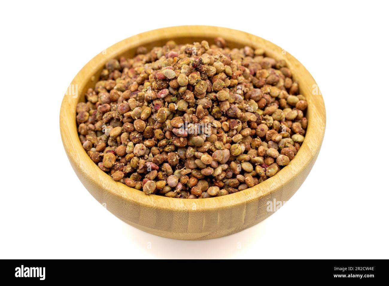 Sumac seeds. Dried sumac berries isolated on white background. Spice