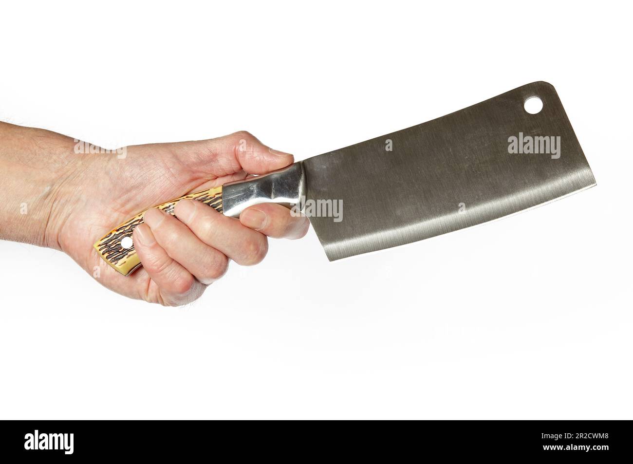 Men's hand holding meat cleaver isolated on white background. Stainless