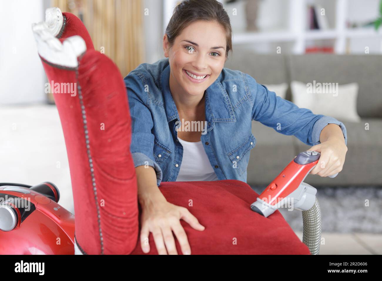 Female worker fixing chair hi-res stock photography and images - Alamy