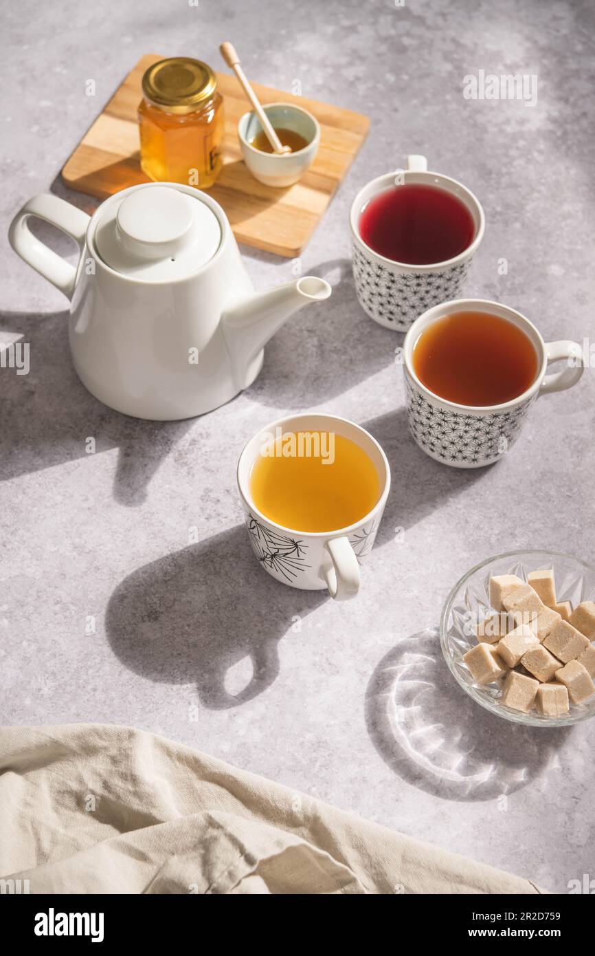 A tea set with sugar and honey Stock Photo