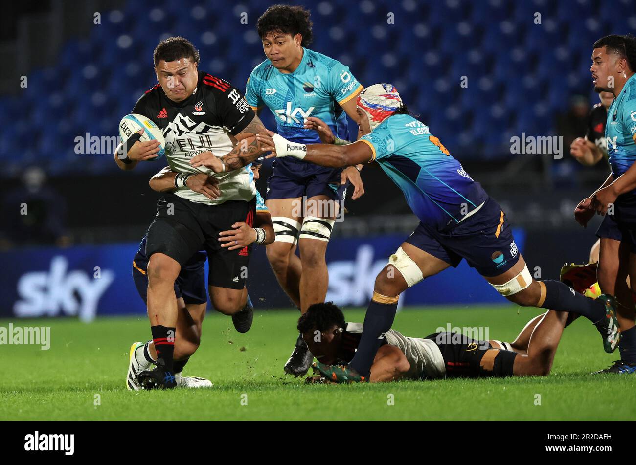 Tamaiti Williams of The Crusaders and Solomone Funaki of Moana Pasifika during the Super Rugby