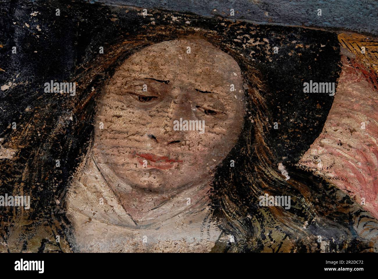 Face of an angel with downcast eyes. Renaissance fresco in the ...