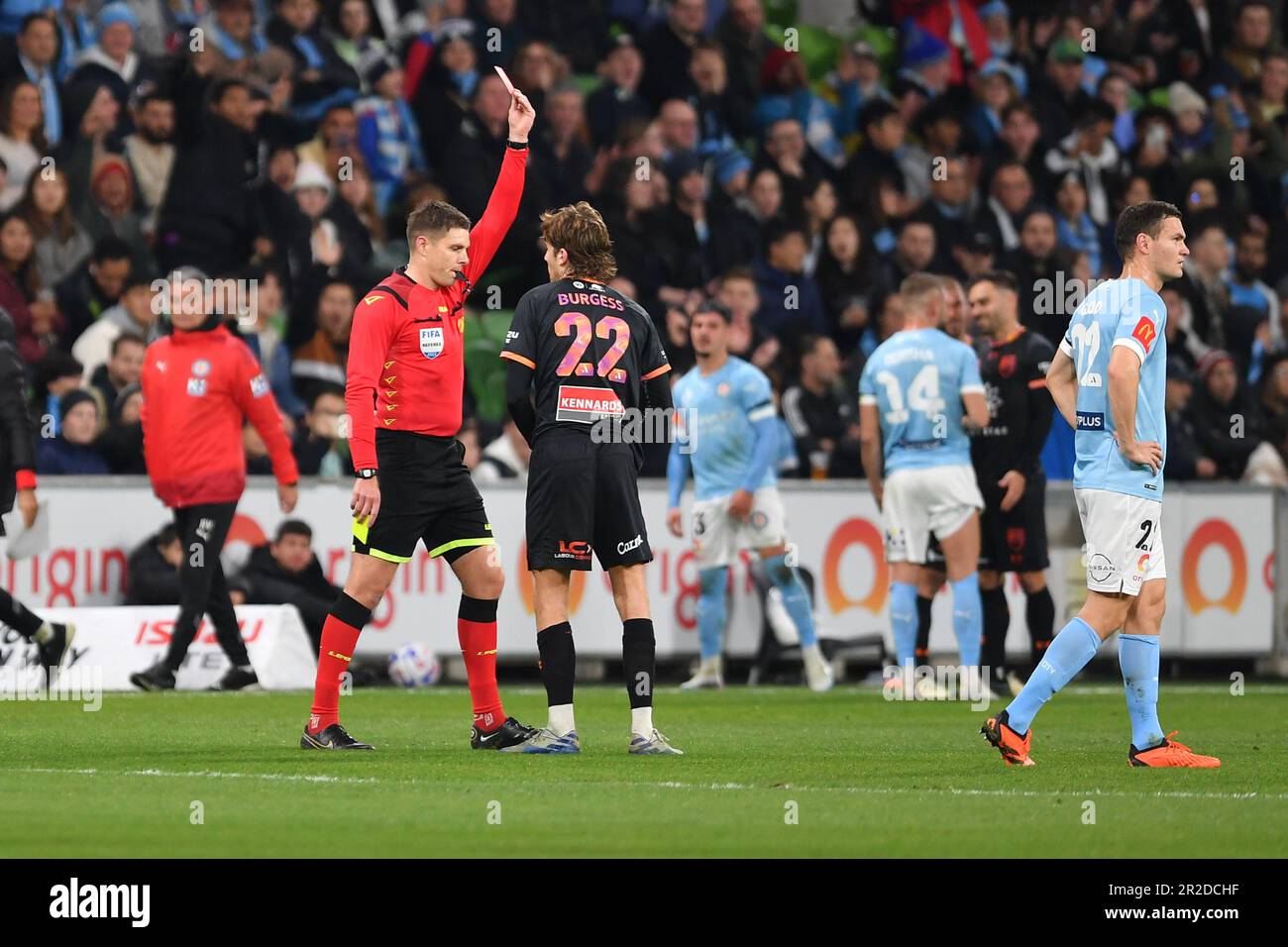 Melbourne, Australia. 19 May 2023, Isuzu UTE A-League Finals Series, Melbourne City v Sydney FC. Pictured: The referee shows the red card to Sydney FC midfielder Max Burgess following a review of a foul on City’s Marco Tilio at Melbourne’s AAMI Park. Credit: Karl Phillipson/Alamy Live News Stock Photo