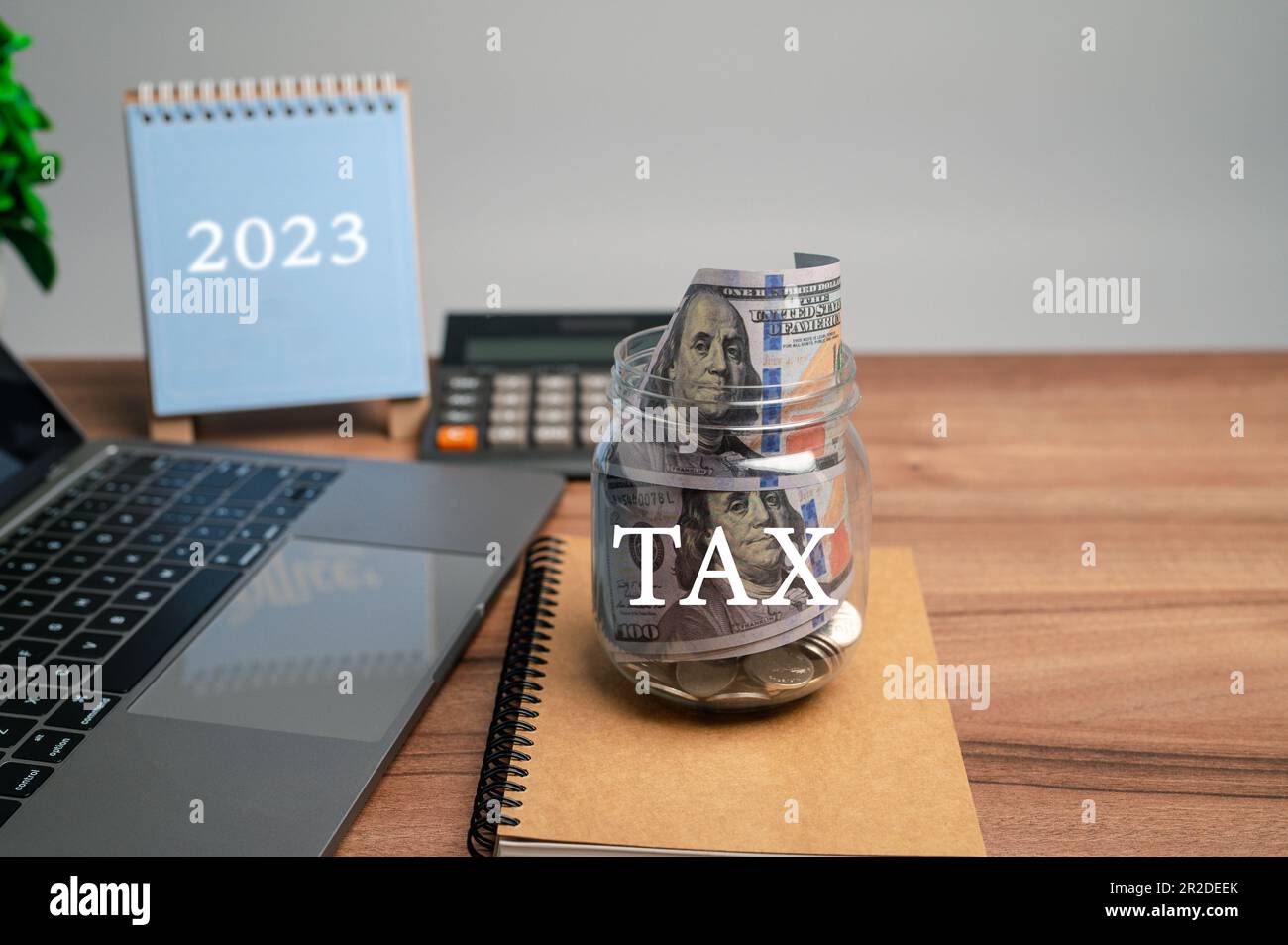 Desktop calendar for 2023 on desk beige. plan pay tax year. Calendars ...