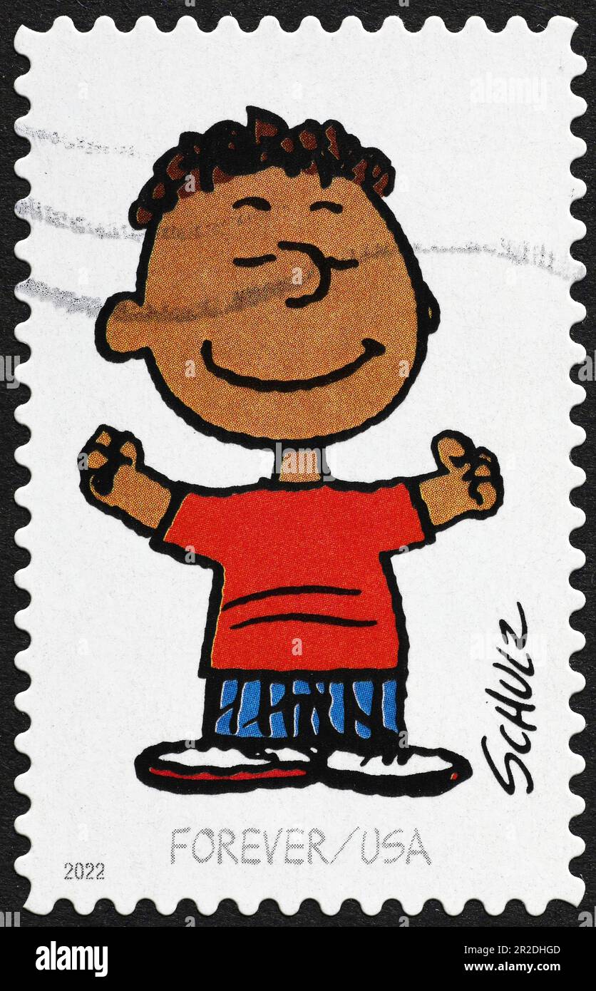 Franklin, character of Peanuts on postage stamp Stock Photo Alamy