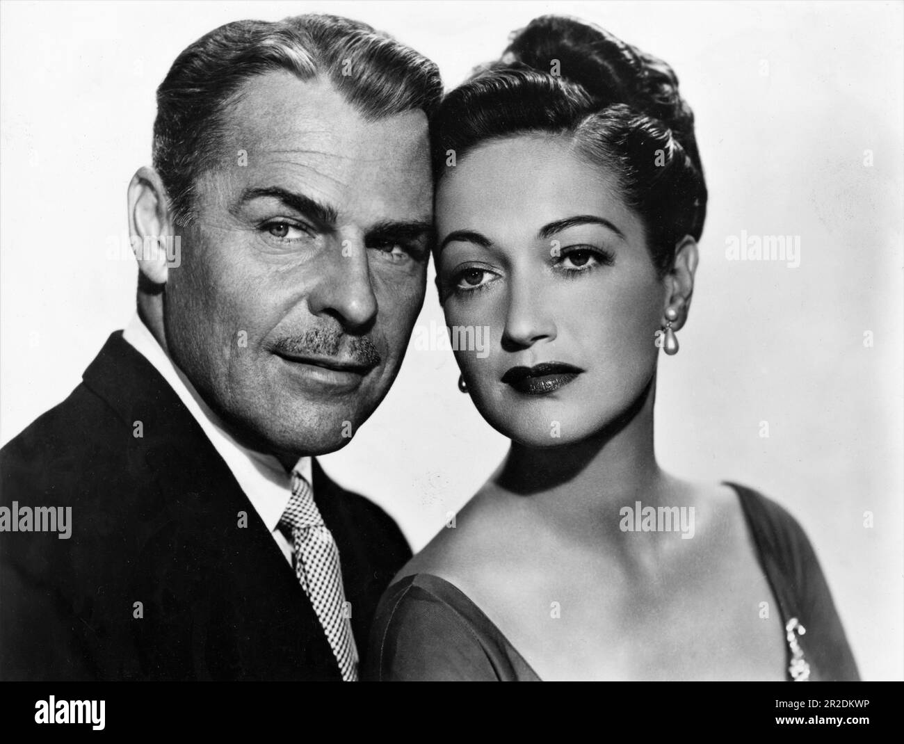BRIAN DONLEVY and DOROTHY LAMOUR Portrait in THE LUCKY STIFF 1949 director / screenplay LEWIS R. FOSTER novel Craig Rice producer Jack Benny Amusement Enterprises Inc. / United Artists Stock Photo