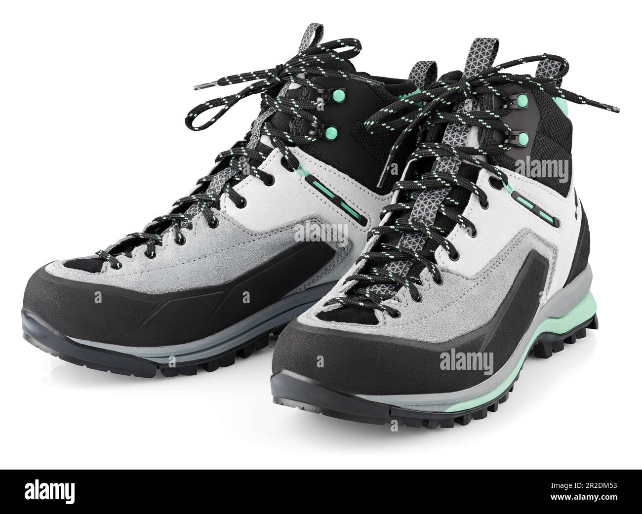 New sports hiking boots with shoelaces bow isolated on white background. Winter trekking shoes