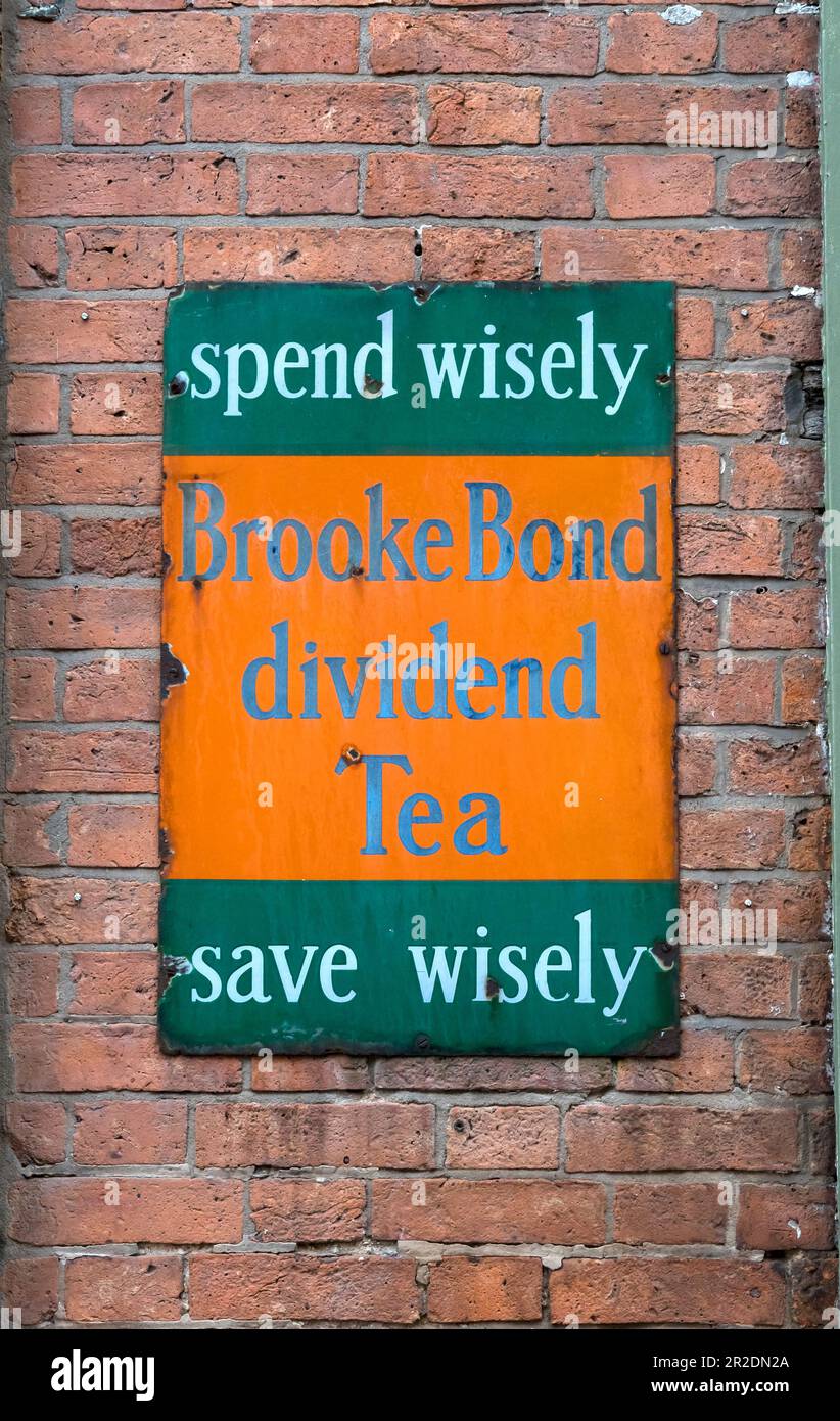 Old metal enamelled Brooke Bond tea sign on wall of building, Steep Hill, old town, Lincoln city 2023 Stock Photo